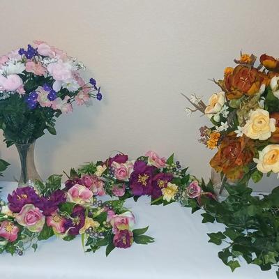 Faux flowers Boquet's and door swaths with glass vases