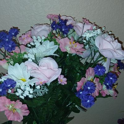 Faux flowers Boquet's and door swaths with glass vases