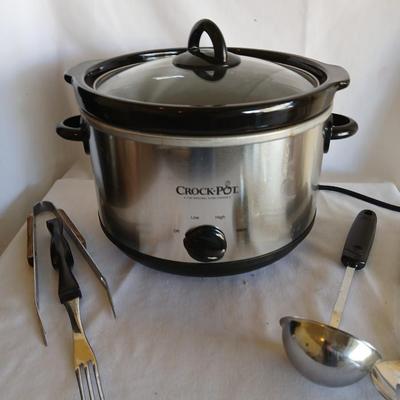 Three-piece Crock Pot the original slow cooker with some serving utensils