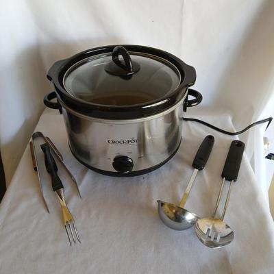Three-piece Crock Pot the original slow cooker with some serving utensils