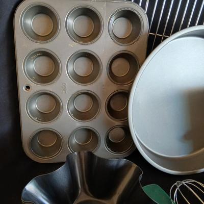 Baking pans - flour sifter - Measuring cups - cooling racks -whisk and more for baking