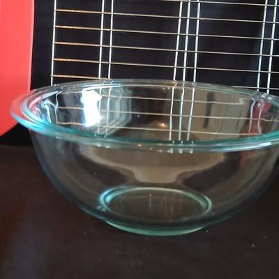 Glass Pyrex baking dishes glass mixing bowl and a cooling rack