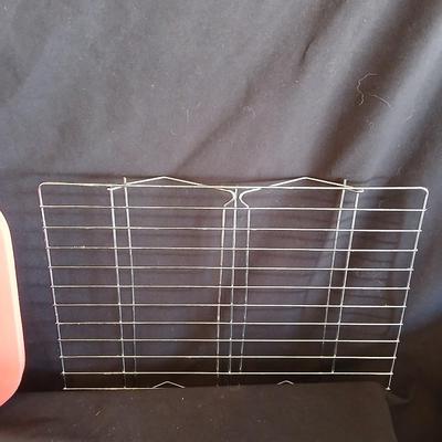 Glass Pyrex baking dishes glass mixing bowl and a cooling rack