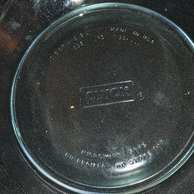 Glass Pyrex baking dishes glass mixing bowl and a cooling rack