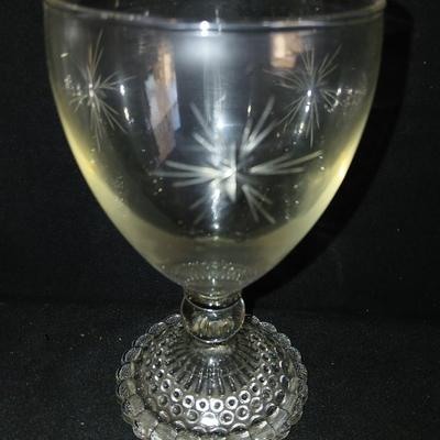 Twelve matching Bubble footed glasses with etched starburst design