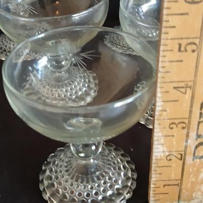 Twelve matching Bubble footed glasses with etched starburst design