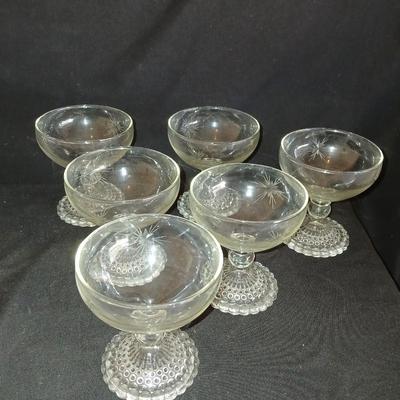 Twelve matching Bubble footed glasses with etched starburst design
