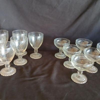 Twelve matching Bubble footed glasses with etched starburst design