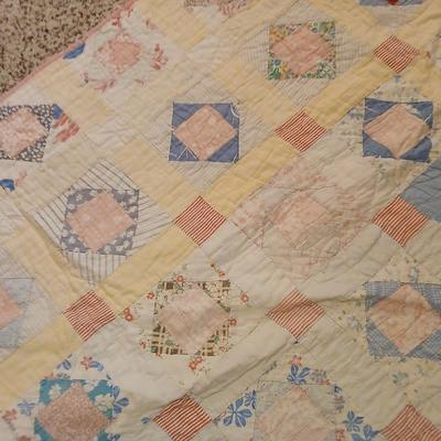 Two antique handmade quilts