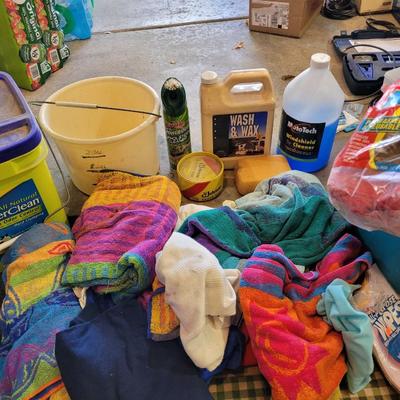 Lot of car wash items and shop towels