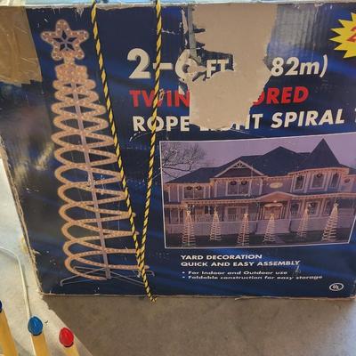 Sale Photo Thumbnail #58: Two 6 foot rope light spiral trees.Three electric plastic candelabras, working, a couple of bulbs are out one santa clause who needs a bulb and maybe a little paint, stockings for craft projects. NOTE, LAST POC IS ADDITIONAL CANDELABRA THAT I found, there