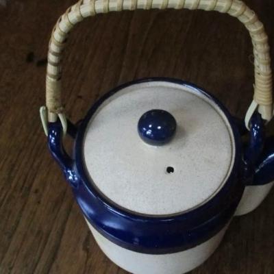 Vintage cobalt blue stoneware teapot with rattan handle