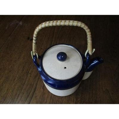 Vintage cobalt blue stoneware teapot with rattan handle