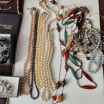 Large Lot Costume Jewelry Monet , Talbots, Pulsar, Avon, Trifari Earings Necklaces , Pins, Watch, Alex & Ani2 Boxes .