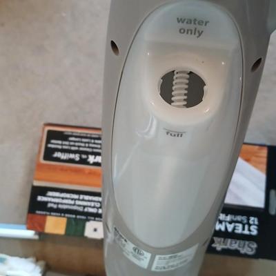 Shark steam spray mop and an Ettore window cleaning squeegee