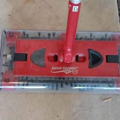 Swivel sweeper and a Swiffer wet jet mop