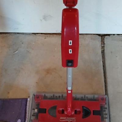 Swivel sweeper and a Swiffer wet jet mop