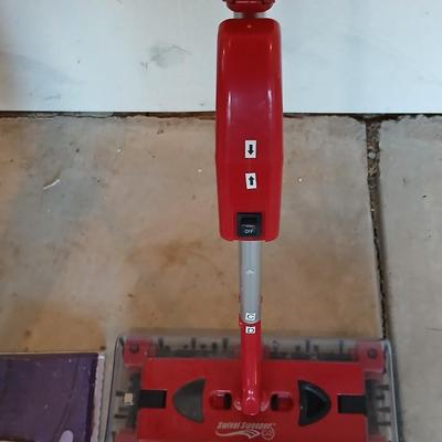 Swivel sweeper and a Swiffer wet jet mop