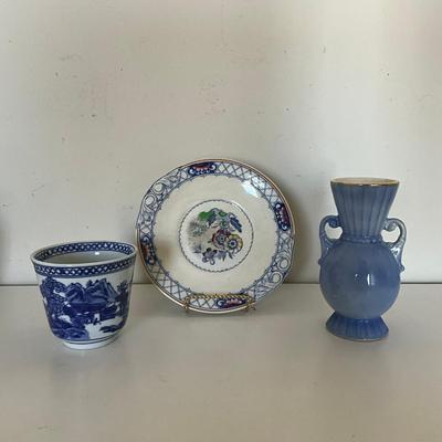 Sale Photo Thumbnail #1144: Three piece set
Floral design plate
Blue & White Chinese Motif Cup
Small Blue Vase With Dual Handle
Mottahedeh tea cup & mustard pot