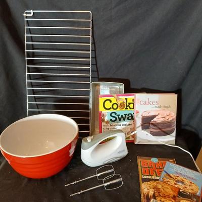 Baking pans, with large glass mixing bowl, cooling rack, and Kitchen Gourmet electric mixer