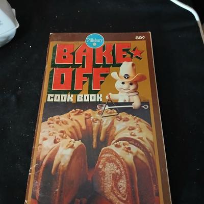 Baking pans, with large glass mixing bowl, cooling rack, and Kitchen Gourmet electric mixer
