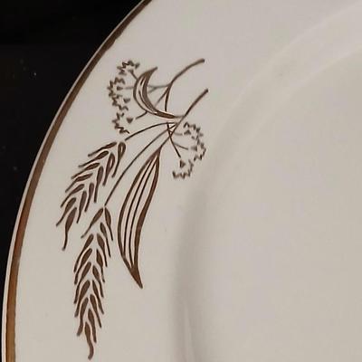 A half cup of coffee mug, divided glass tray, large bowl with plate, glass platter and more