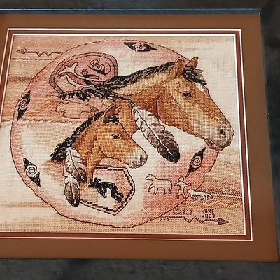 Two framed wall art - Windmill by Jessi Scott - and a cross stitch of Tribal Ponies