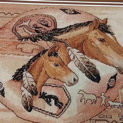 Two framed wall art - Windmill by Jessi Scott - and a cross stitch of Tribal Ponies