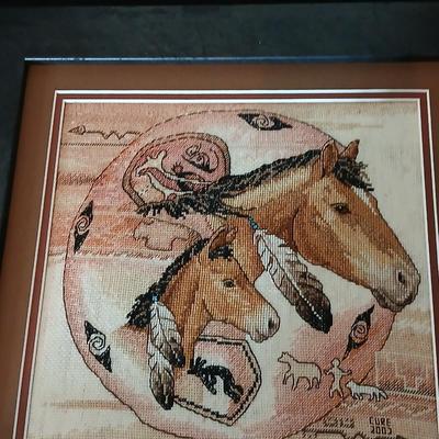 Two framed wall art - Windmill by Jessi Scott - and a cross stitch of Tribal Ponies