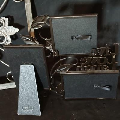 Square metal wall art and a Live Laugh Love photo frame
