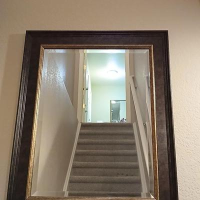 Beveled glass framed Mirror with a Inganam Quartz wall clock
