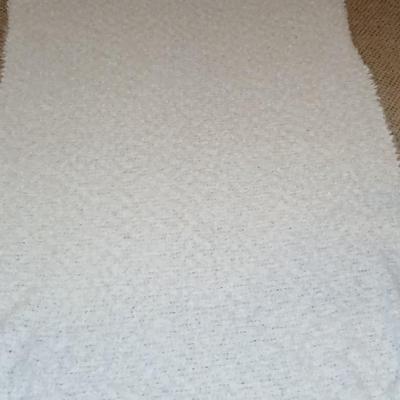 Two throw pillows and a Bella Lux Fine Linen light weight blanket