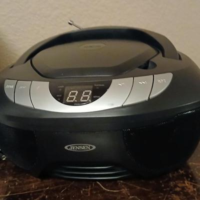 Jensen Portable CD player with Auxiliary Input jack and AM/FM radio