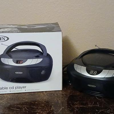 Jensen Portable CD player with Auxiliary Input jack and AM/FM radio