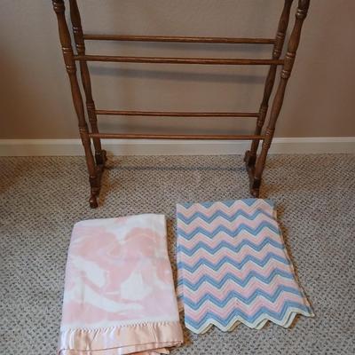 Oak Quilt rack with two baby blankets