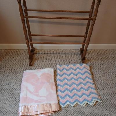 Oak Quilt rack with two baby blankets