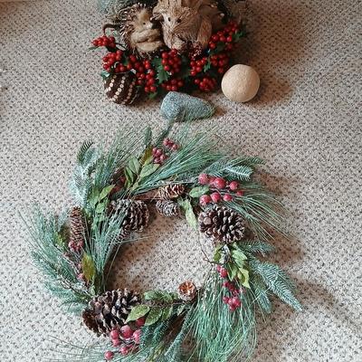 Christmas wreath with basket of holly, and pine with adorable porcupines