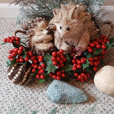 Christmas wreath with basket of holly, and pine with adorable porcupines