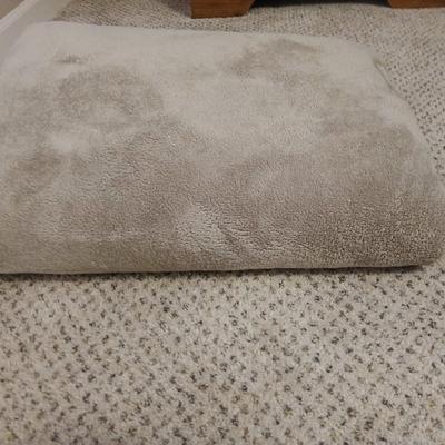 Two queen size blankets and a wedge pillow