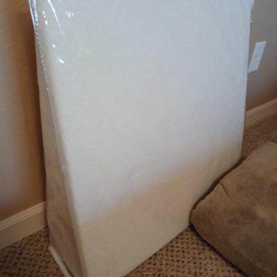 Two queen size blankets and a wedge pillow