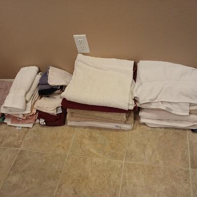Assortment of mismatched bath towels - washcloths - and hand towels