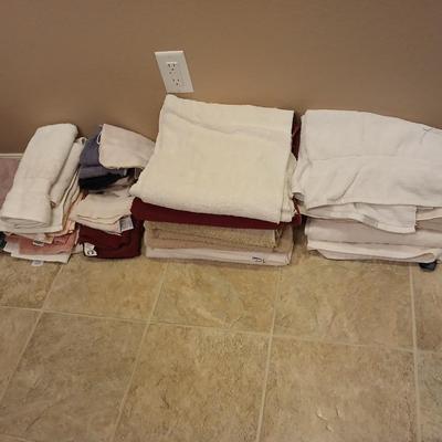 Assortment of mismatched bath towels - washcloths - and hand towels