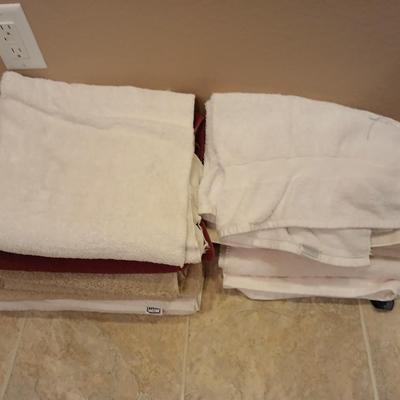 Assortment of mismatched bath towels - washcloths - and hand towels