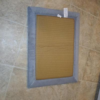 Grey and maroon towels with a better homes & garden memory foam bathmat