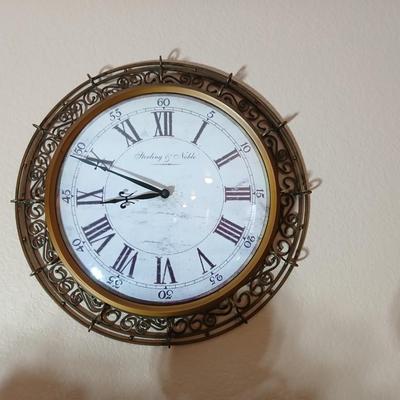 Metal framed Sterling & Noble Wall clock with candle sconces and wicker coasters