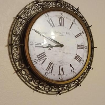 Metal framed Sterling & Noble Wall clock with candle sconces and wicker coasters