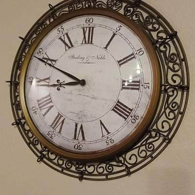 Metal framed Sterling & Noble Wall clock with candle sconces and wicker coasters