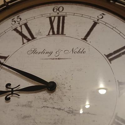Metal framed Sterling & Noble Wall clock with candle sconces and wicker coasters