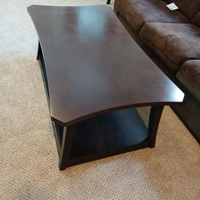Two tone finish round coffee table on casters - easy to move!