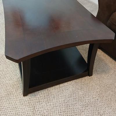 Two tone finish round coffee table on casters - easy to move!